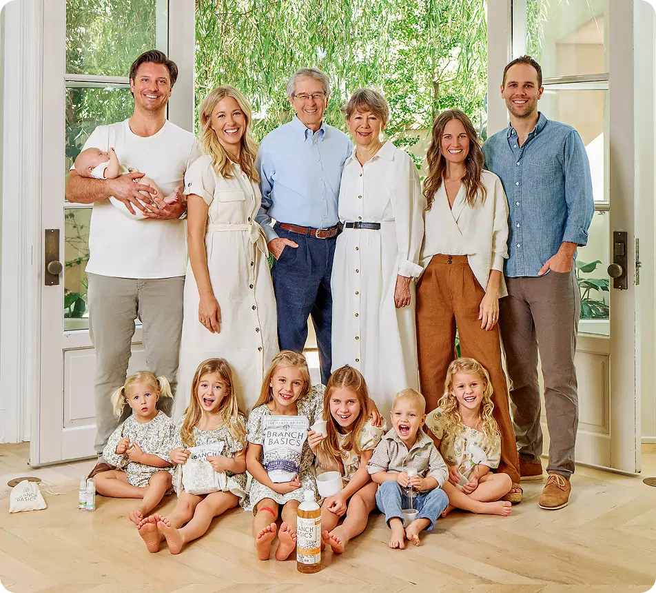 From right-to-left: Allison, Marilee, and Kelly posed with their spouses and children.